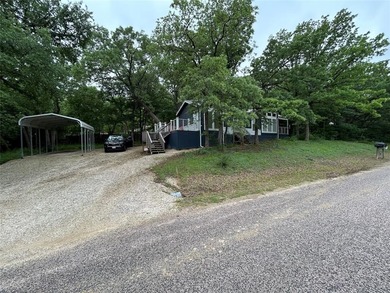 Lake Home For Sale in Gordonville, Texas