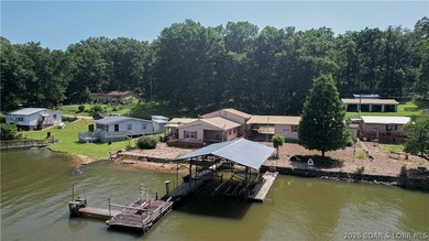 Lakefront home with Endless Potential! This 3-bedroom, 2-bath - photo 1