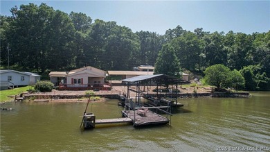 Lakefront home with Endless Potential! This 3-bedroom, 2-bath - photo 2