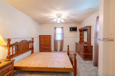 Lakefront home with Endless Potential! This 3-bedroom, 2-bath - photo 5