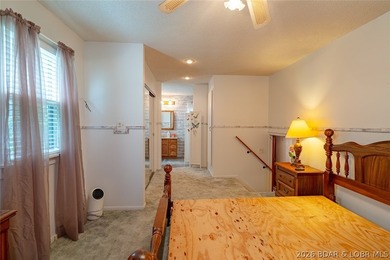 Lakefront home with Endless Potential! This 3-bedroom, 2-bath - photo 6