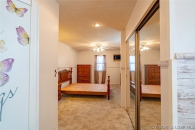 Lakefront home with Endless Potential! This 3-bedroom, 2-bath - photo 9