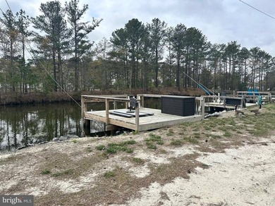 Experience the ultimate in waterfront living with this - photo 2