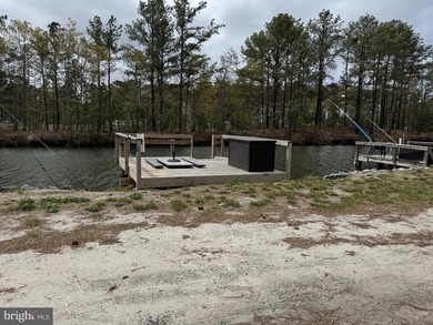 Experience the ultimate in waterfront living with this - photo 3