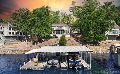 This 3-bedroom, 2-bath home on Nonsuch in Lake Ozark is now - photo 1