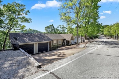 This 3-bedroom, 2-bath home on Nonsuch in Lake Ozark is now - photo 3