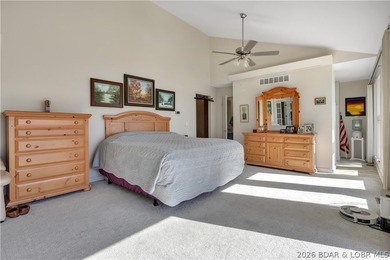 This 3-bedroom, 2-bath home on Nonsuch in Lake Ozark is now - photo 7