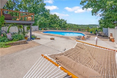 Nestled on over 2 acres with panoramic views of Lake of the - photo 9