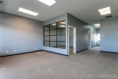 Professional office/retail building on Osage Beach Parkway with - photo 6