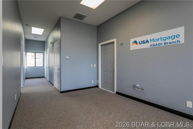 Professional office/retail building on Osage Beach Parkway with - photo 10