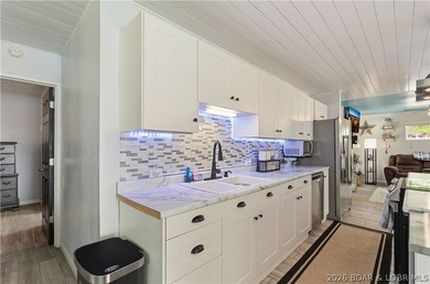 Perfectly located in the heart of Osage Beach, this beautifully - photo 9