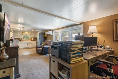 Welcome to your lake retreat! This darling cabin is in a quiet - photo 5
