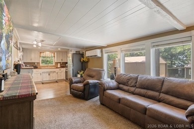 Welcome to your lake retreat! This darling cabin is in a quiet - photo 6