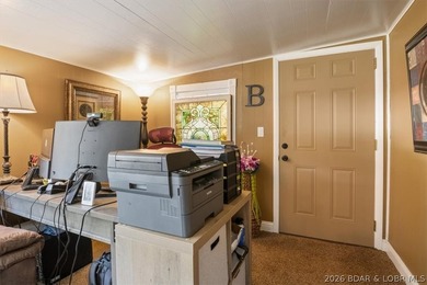Welcome to your lake retreat! This darling cabin is in a quiet - photo 7