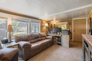 Welcome to your lake retreat! This darling cabin is in a quiet - photo 8