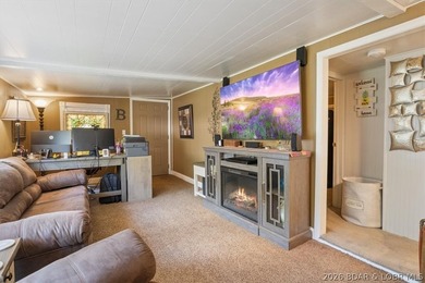 Welcome to your lake retreat! This darling cabin is in a quiet - photo 9