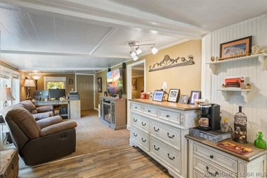Welcome to your lake retreat! This darling cabin is in a quiet - photo 10