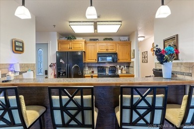 TURNKEY! Lakefront Living with Rare Extras in the Heart of - photo 10