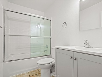 This beautifully updated 4-bedroom, 2-bathroom home with a 2-car - photo 11