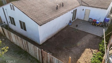 This beautifully updated 4-bedroom, 2-bathroom home with a 2-car - photo 28