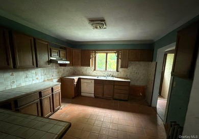 Tudor Style Home. This Home Features 4 Bedrooms, 3 Full Baths - photo 12