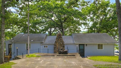There's something familiar about this lake house. Maybe it's the - photo 3