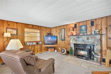 There's something familiar about this lake house. Maybe it's the - photo 8