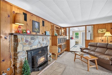 There's something familiar about this lake house. Maybe it's the - photo 9