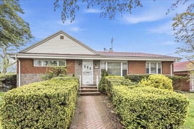 This charming brick detached ranch in Jamaica, Queens offers - photo 1