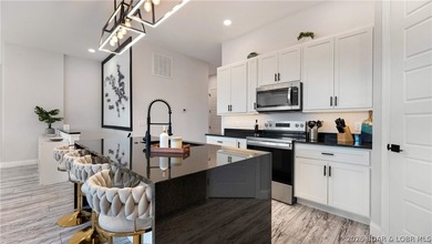 Investment potential meets lake living in this newly constructed - photo 7