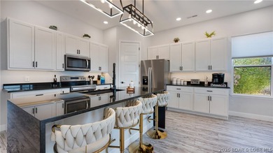 Investment potential meets lake living in this newly constructed - photo 8