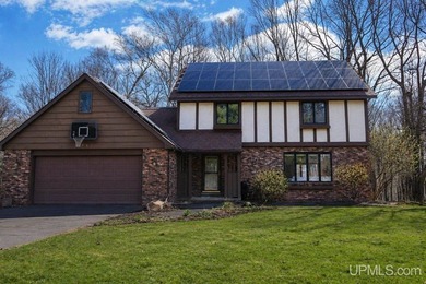 Nestled in one of Marquette's most desirable neighborhoods, this - photo 1