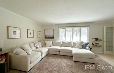 Nestled in one of Marquette's most desirable neighborhoods, this - photo 4