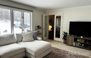 Nestled in one of Marquette's most desirable neighborhoods, this - photo 6