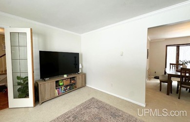 Nestled in one of Marquette's most desirable neighborhoods, this - photo 7