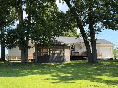 This beautifully updated 2-bedroom, 2 1/2-bath home offers an - photo 1