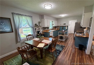 This beautifully updated 2-bedroom, 2 1/2-bath home offers an - photo 3