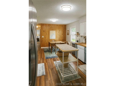 This beautifully updated 2-bedroom, 2 1/2-bath home offers an - photo 5