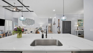 Welcome home to this beautifully designed five bedroom, two and - photo 11