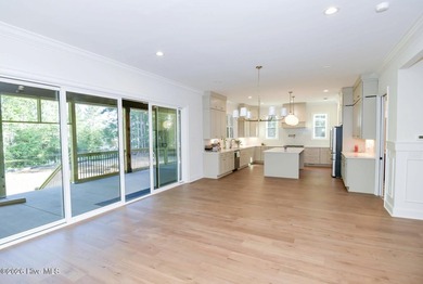 Welcome to this stunning 3,700 sf waterfront home built by - photo 12
