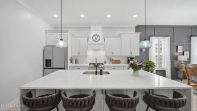 Welcome home to this beautifully designed five bedroom, two and - photo 13