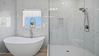 Welcome home to this beautifully designed five bedroom, two and - photo 19