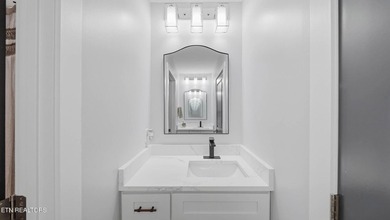 Welcome home to this beautifully designed five bedroom, two and - photo 23