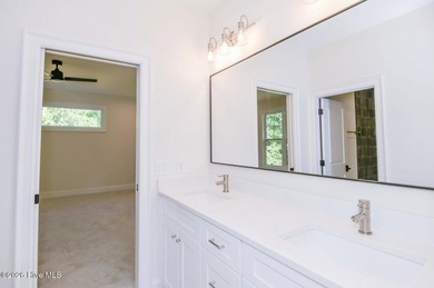 Welcome to this stunning 3,700 sf waterfront home built by - photo 26