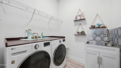 Welcome home to this beautifully designed five bedroom, two and - photo 28
