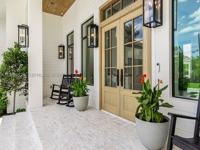 Welcome to a newly constructed 2026 modern estate set along the - photo 2