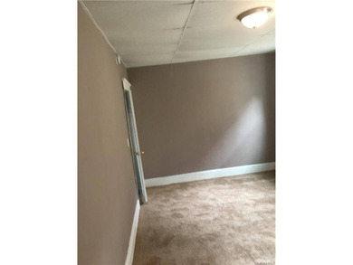 Large three family investment property. Two of the units are - photo 13
