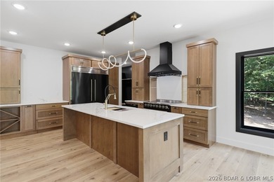 Luxury craftsmanship meets Lake living in this exceptional new - photo 5