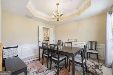Nestled in the highly sought-after Waters Edge, this traditional - photo 5