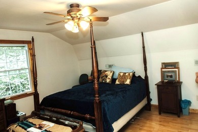 Surrounded by nature, this charming 3-bedroom, 2-bath waterfront - photo 15